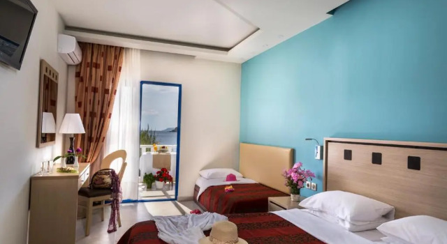 Трёхместный номер Hotel Porto Koufo