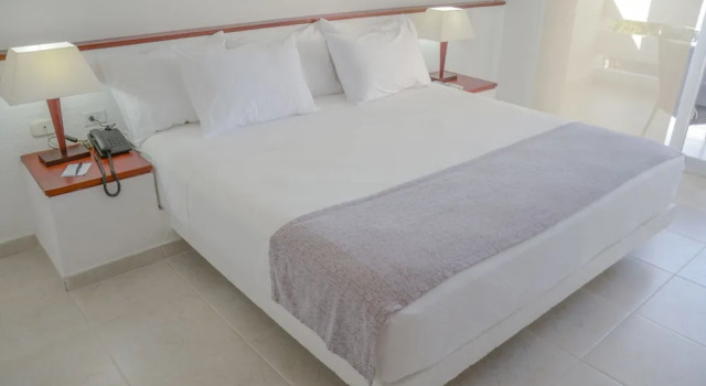 Четырёхместный номер Standard Blu Hotel by Tamaca