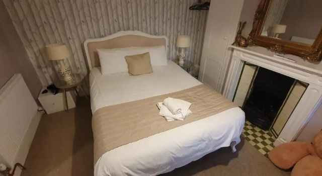 Трёхместный семейный люкс Deluxe Guestling Hall Hotel