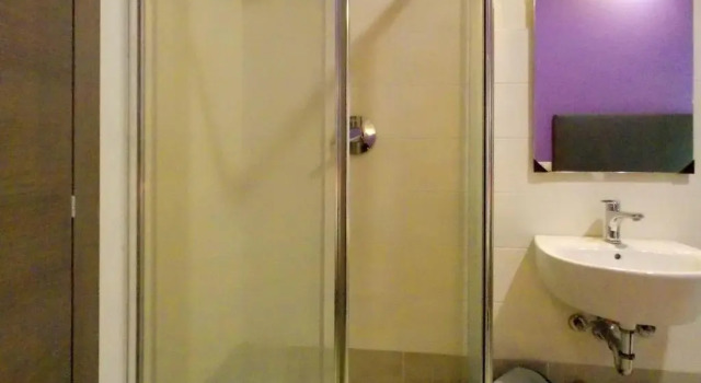 Кровать в общем номере Hotel Midtown Milano
