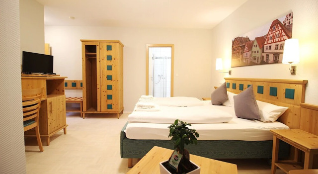 Трёхместный семейный номер Standard с балконом Aparthotel Alte Schmiede Dettelbach