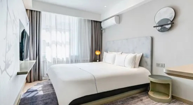 Четырёхместный люкс Hanting Hotel Hailar Railway Station Central Street