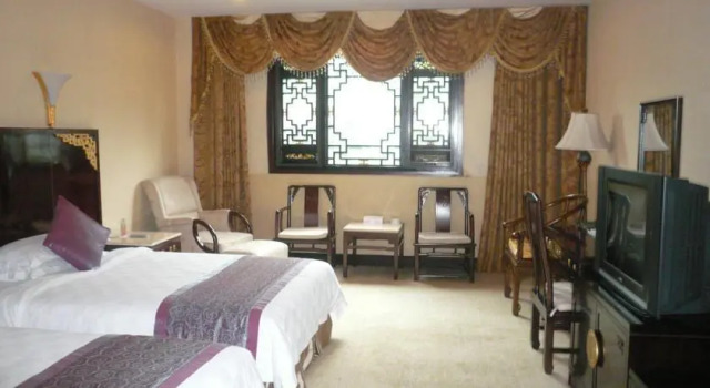 Tao Ran Ju New Contryside Golden Sunshine Eco-Hotel, Prenota Hotel Baisha 