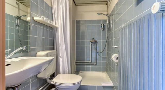 Кровать в общем номере FF&E Hotel Dania