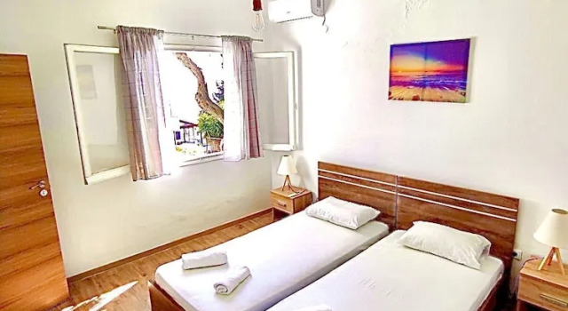 Номер Comfort с 2 комнатами с видом на море Akrogiali Apartments