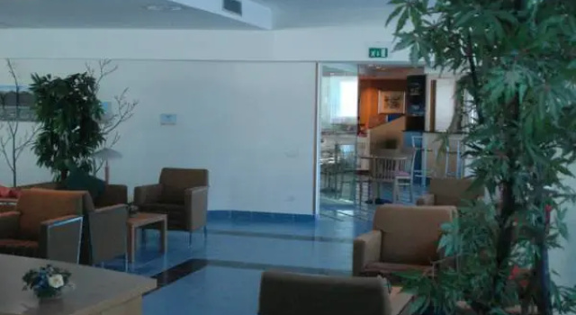 Кровать в общем номере Express Hotel Aosta East