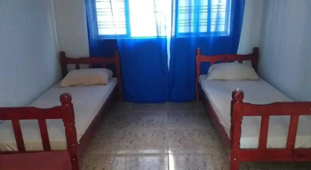 Кровать в общем номере Hostel Goiânia..