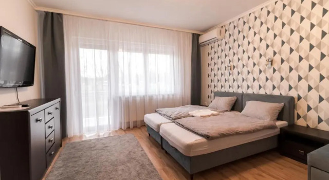 Апартаменты Weninger Apartman Lakás