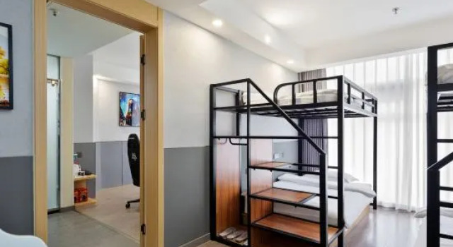 Кровать в общем номере Chuangdian Jingzhixuan Hotel (Guangming Road)