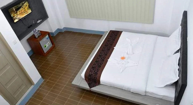 Queen's Land Inn, Rezerwuj Hotel Sawbwagyigon Yangon downtown
