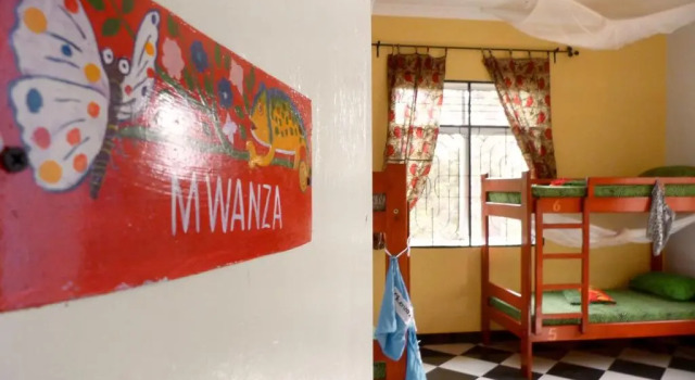 Łóżko w pokoju wieloosobowym Rafiki Backpackers & Guesthouse