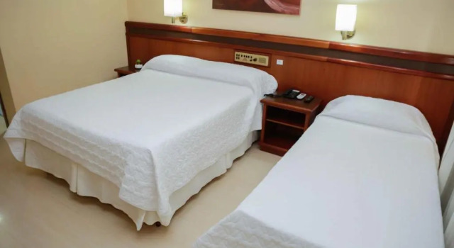 Трёхместный номер Luxury Susin Hotel