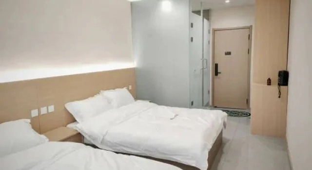 Кровать в общем номере Huiyang Yingliju Homestay