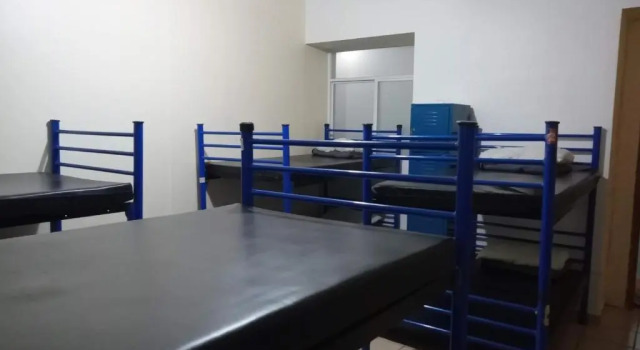 Кровать в общем номере Hostal Amigo