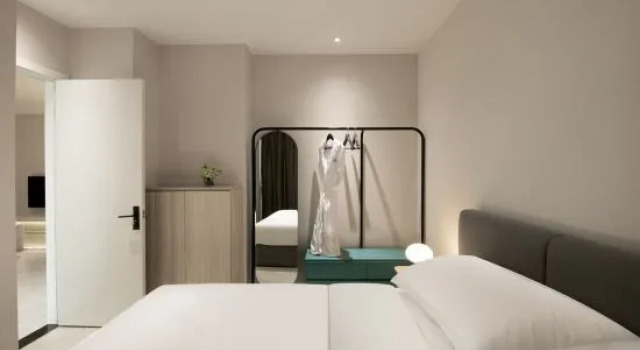 Двухместный люкс с 2 комнатами с видом на сад MORDIN Xinfei International Apartment