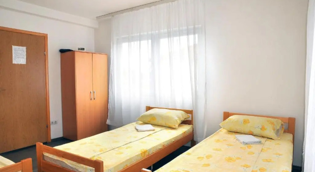Кровать в общем номере Hostel Room