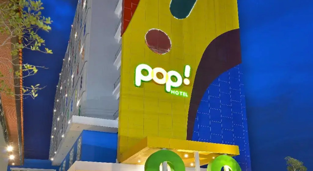 Кровать в общем номере POP! Hotel Tanjung Karang