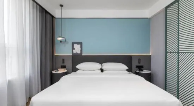Люкс Deluxe Country Inn & Suites by Radisson Hotel (Changchun FAW Wandaguangchang Checheng)