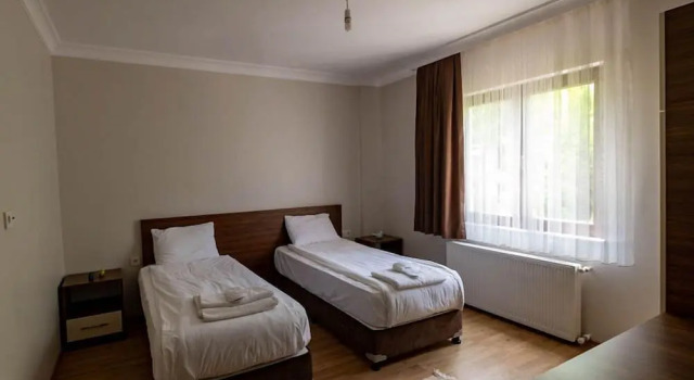 Вилла с 4 комнатами с балконом Guzel Evler Family Resort