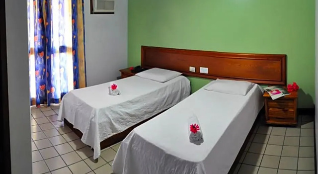 Четырёхместный номер Standard с балконом Rede Andrade Estrela Dalva Centro Hotel