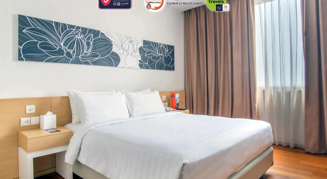 Кровать в общем номере Citadines Connect Airport Jakarta Hotel