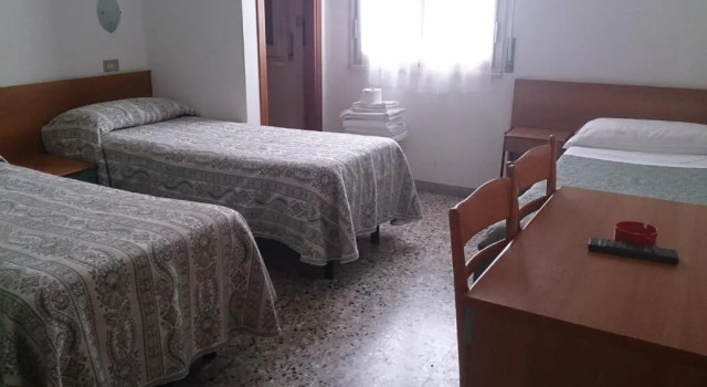 Четырёхместный номер Отель Cortina