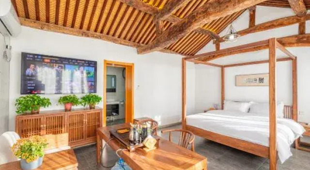 Кровать в общем номере с 6 комнатами Beijing Nanshan Xiaozhu Bout Homestay (Miyunshan Ski Resort)