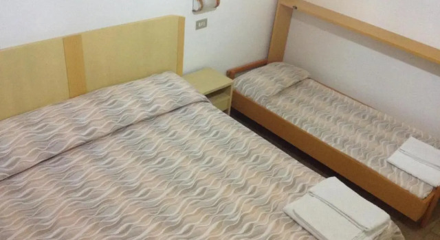 Трёхместный семейный номер Standard Hotel La Caravella