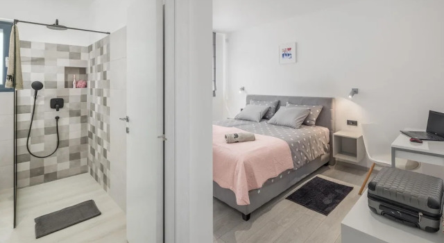 Beautiful Home in Rebici with Hot Tub, Sauna & 4 Bedrooms