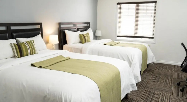 Четырёхместный номер Executive Hôtel Énergie Shawinigan