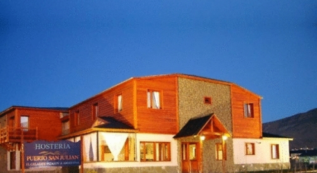Кровать в общем номере Hosteria Puerto San Julian