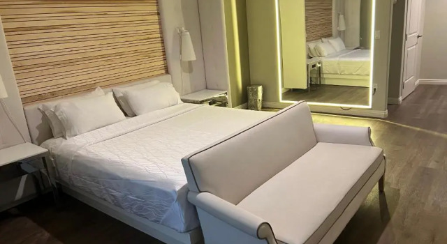 Номер Deluxe ASPIRE INN & SUITES Orange