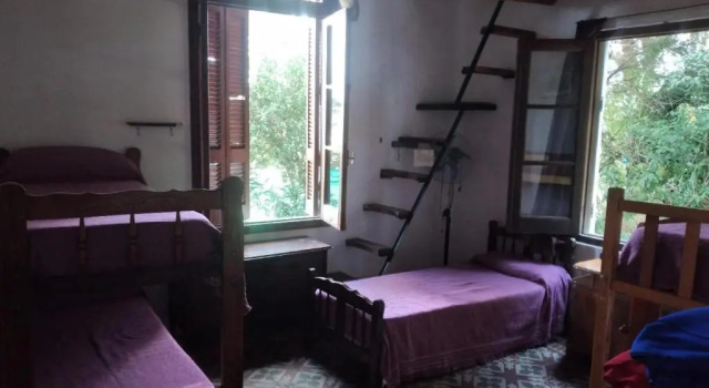 Кровать в общем номере Hunab Ku Hostel