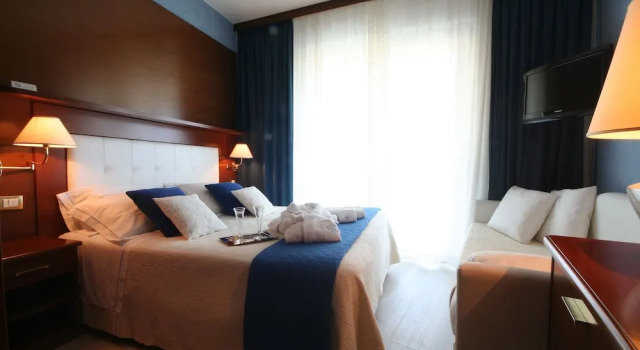 Трёхместный номер Comfort с балконом и с частичным видом на море Hotel Corallo