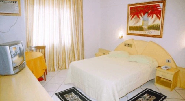 Кровать в общем номере Hotel das Américas