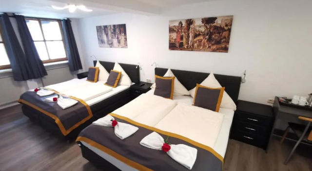 Четырёхместный номер Standard City House Alpeneck