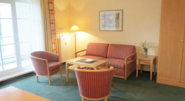 Апартаменты Ferienwohnung 1 2 12 Inselstrand