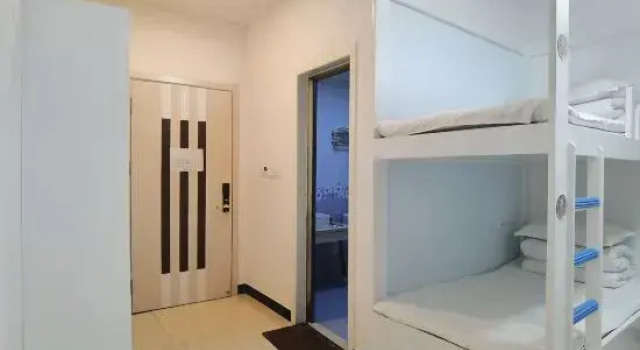 Кровать в общем номере Tianjingsha Youth Hostel