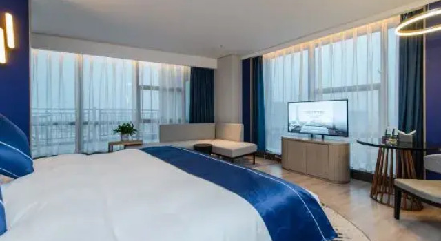 Люкс Wanxiang Hotel (huaihua guojishangmaocheng guomaodian)