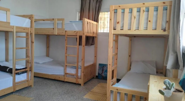 Кровать в общем номере Surf Riad Taghazout