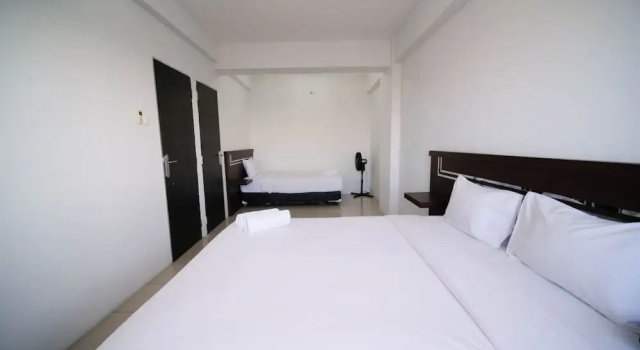 Appartement Simple 2Br With Extra Bed At Menara Rungkut Apartment