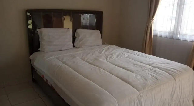 Номер Standard Hotel O Njy House SyariahNearBandara Sultan Syarif Kasim II
