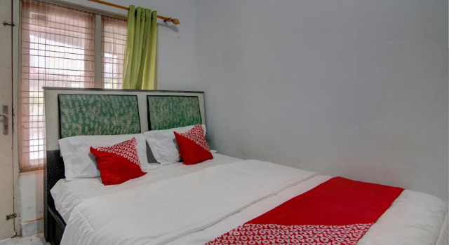 Номер Deluxe OYO 92833 Penginapan Syariah