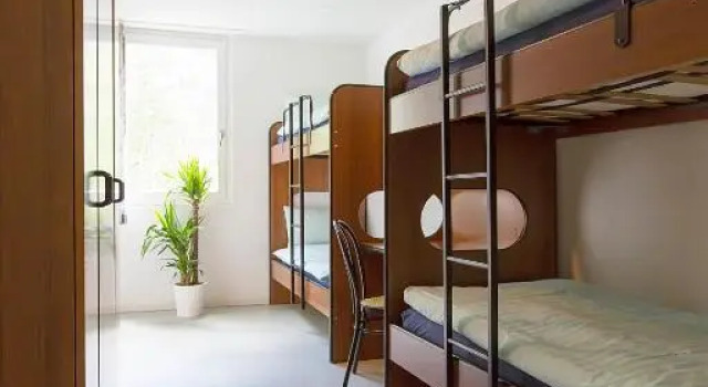 Кровать в общем номере Casa di vacanza Giovanibosco