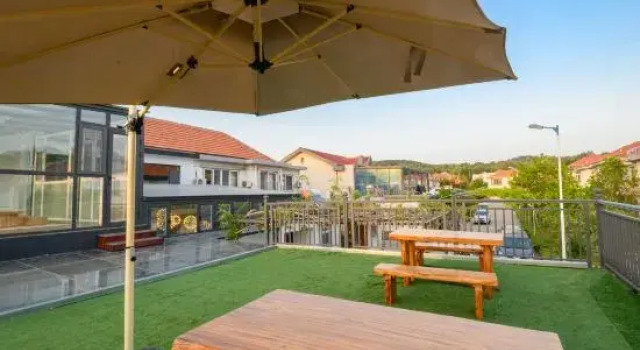 Long Island Dongmei Homestay, Prenota Hotel Hotel a Shandong con parcheggio, Parcheggio