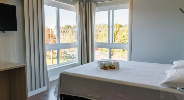 LOCAR-IN CANELA Apartamento Junto a Rua Coberta Amplo para 9 pessoas