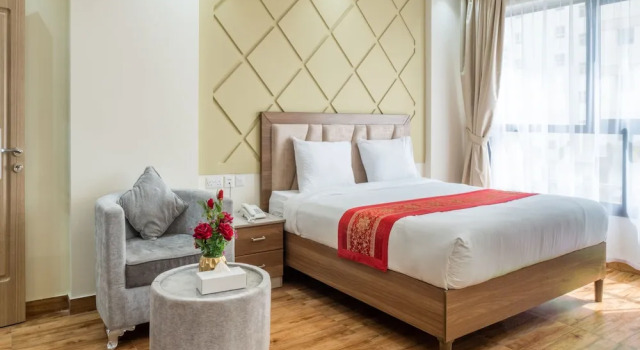 Апартаменты OYO Townhouse 156 Rose Hotel Apartments.