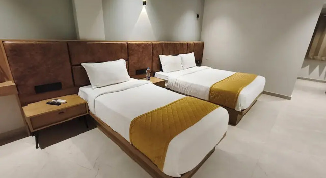 Трёхместный номер Deluxe Hotel Beverly Plaza Kozhikode