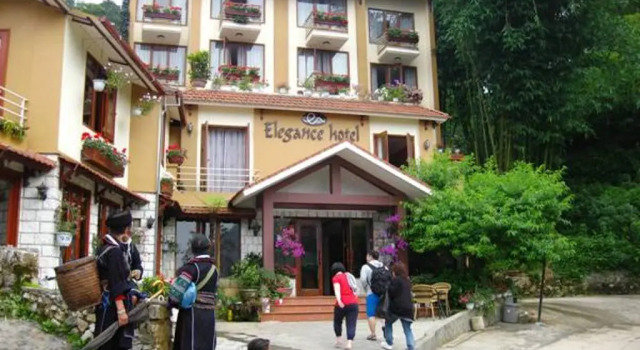 Кровать в общем номере Sapa Elegance Hotel