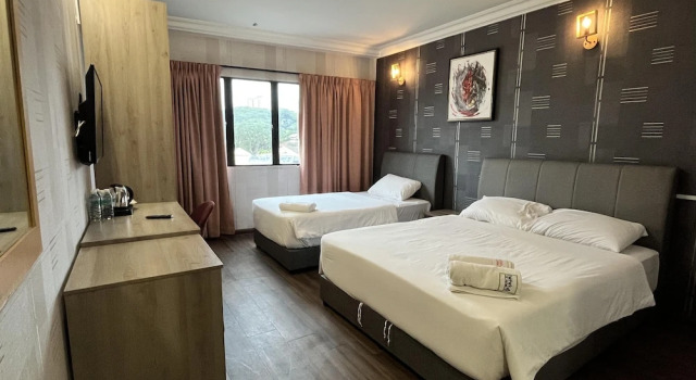 O podwyższonym standardzie trzyosobowy pokój Fair Park Hotel